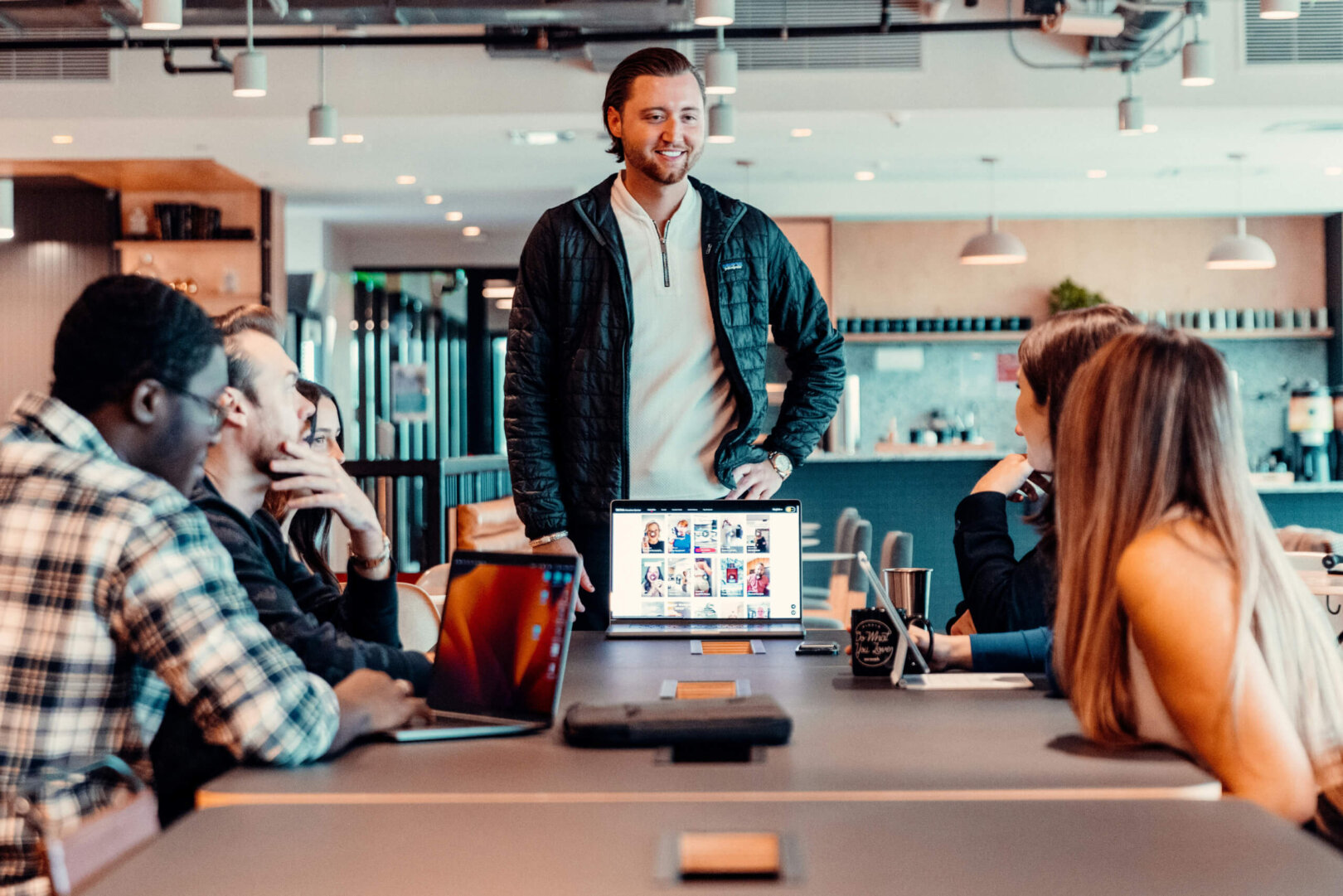 Business professionals planning IT strategy in modern office