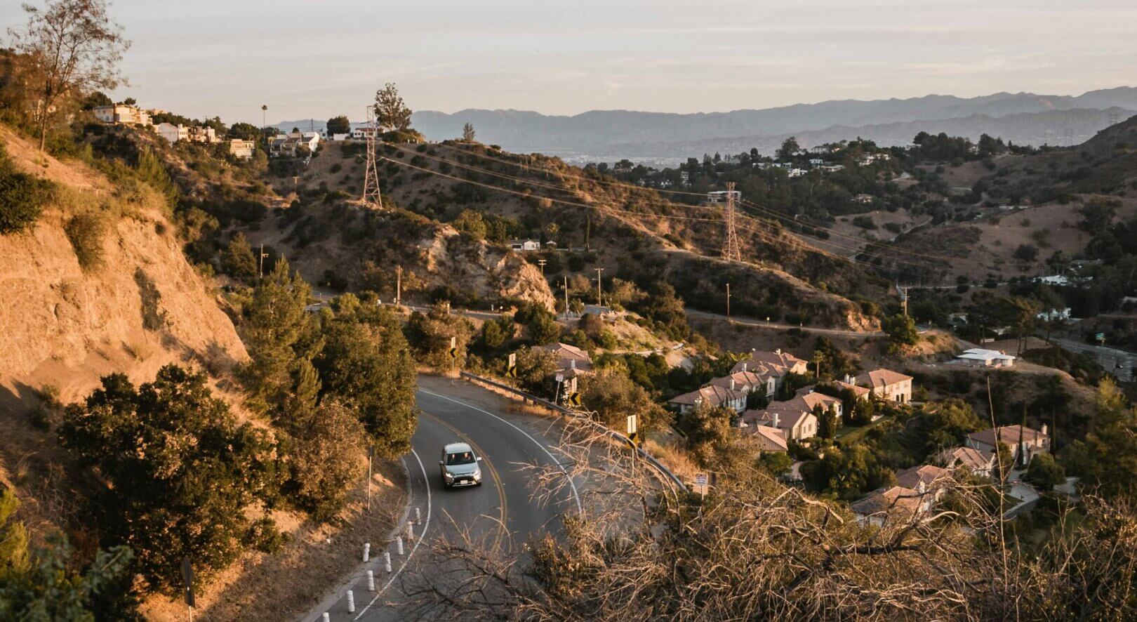 Rancho Los Cerritos in Long Beach, CA, featuring a preserved adobe ranch house, vibrant gardens, and historic architecture.