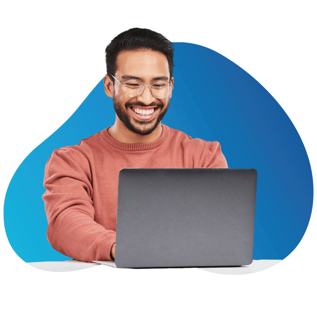 Professional smiling while working on a laptop, exploring AI and data intelligence solutions with Mytech Partners
